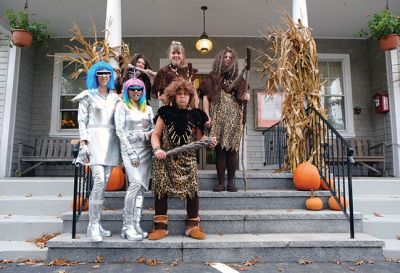  Town Hall-oween
 Town Hall-oween (clockwise from left): Mattapoisett employees Suzanne Szyndlar, Alanna Carreiro, Sarah Piehler, Catherine Heuberger, Brenda Herbeck, and Wendy Travers renewed their longstanding tradition of themed costumes. But while the distant future and prehistoric past themes were planned respectively, the juxtaposition of the two was complete coincidence, the women said. Photo by Shawn Badgley.
