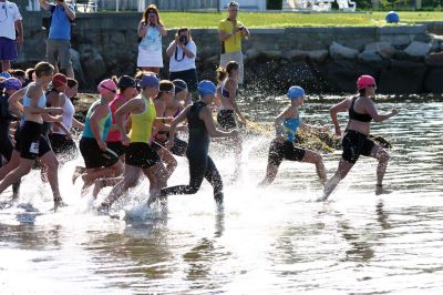 2011 Triathlon
240 athletes kicked off the Harbor Days week on July 10, 2011 with the Mattapoisett Lions Triathlon, which started from Mattapoisett Town Beach and included a .25-mile swim, a 10-mile bike ride and a 3-mile run. The mens winner for the Triathlon was Keith Putnam or Marston Mills, MA with a time of 52:52, and the womens winner was Katie McCully of Eastham, MA with a time of 58:51. Photo by Anne Kakley.
