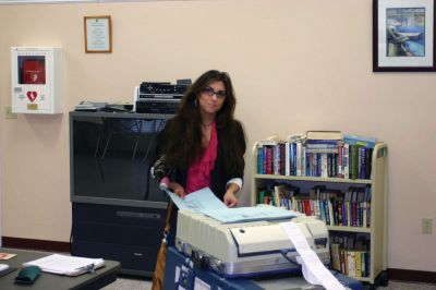 Rochester Elections
Sherry Melo of Rochester casts her ballot on Wednesday April 13, 2011 in the town election. The rainy weather held turnout to just 415 hearty voters. Photo by Chris Martin.
