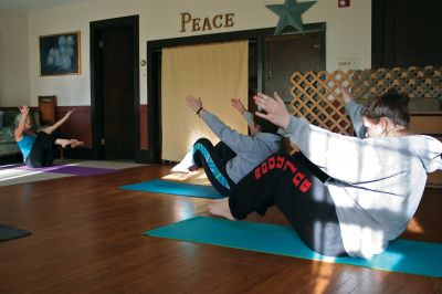 Namaste
Rochester Women's Club member Marsha Hartley conducted a yoga class at the Clubhouse on Marion Rd in Rochester on Saturday, January 7, 2012. The classes are a fundraiser for the club to make repairs on their clubhouse. For information on the yoga classes, please call Ms. Hartley at 508-322-0998. Photo by Robert Chiarito.
