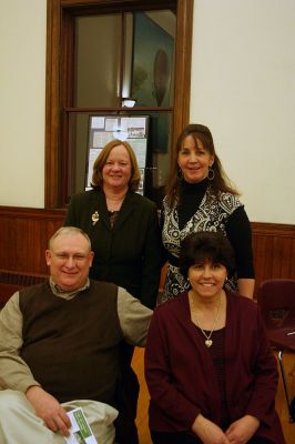 Folk Benefit
Rebecca McCullough (top back), Director of Development of the Women's Center of New Bedford, with special events coordinator Alison McKuch (back, right) were on hand along with the organization's Vice President Maria Langevine and her husband Fred at a benefit concert for for the Women's Center at the Marion Music Hall on Saturday evening, March 14. The show featured the folk music group Atwater-Donnelly.
