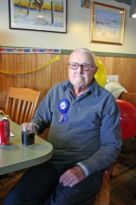 105 in Rochester
Rochester resident Arthur Lionberger celebrated his 105th birthday at the Rochester Bakery on Monday, December 24. A Rochester resident for some 70 years who used to summer in Marion, Mr. Lionberger turned 105 on December 26 but celebrated the milestone early on Christmas Eve with several family members and friends. A former banjo player with The Woodchoppers, Mr. Lionberger enjoyed a hot bowl of soup for his birthday meal. (Photo by Robert Chiarito).

