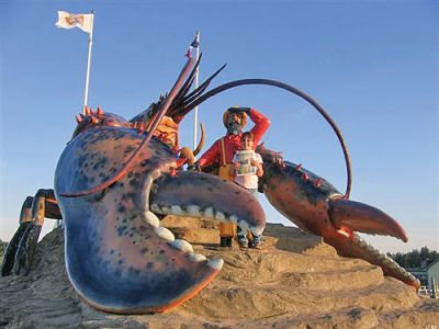 Rock Lobster
Christine Collins of Newton, MA poses at the Worlds Largest Lobster in Shediac, New Brunswick, Canada with a copy of The Wanderer. (Photo by Mark J. Collins) (09/04/08 issue)

