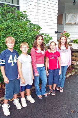 Bridging the Generation Gap
Rochester resident Jillian Jensen (center) poses with a few of her friends and fellow members of the Friends of the Elderly Kids Club which she founded some five years ago. The group makes regular visits to the elderly in area nursing homes and also collects Teddy Bears which they bring as gifts. Pictured here with Jillian are (l. to r.) Alec Govoni (Freetown); Bryce Govoni (Freetown); Danielle Hardy (Acushnet); and Kayla Govoni (Freetown). (Photo by Kenneth J. Souza).
