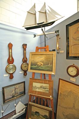 Antique Adventure
This nautical display is just one of the many elaborate exhibits you can expect to see at the sixteenth annual Marion Antiques Show, to take place on Friday, Saturday and Sunday, August 15, 16 and 17 in the Fish Athletic Center of Tabor Academy in Marion. The weekend will include a gala preview party on Friday beginning at 5:30 pm and will continue on Saturday from 10:00 am to 5:00 pm and on Sunday from 11:00 am to 4:00 pm. (Photo courtesy of Kimberly Teves).
