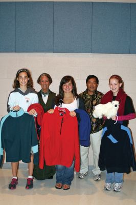 Needs for Nepal
ORR Junior High Student Ambassadors (front, from left) Amanda Frey, Hanna Walsh and Mariah Allen pose with (back, from left) Sally Hunsdorfer and Dawa Sherpa from Nepal during the kickoff presentation for the schools Himalayan Project. Ms. Hunsdorfer frequently makes good will journeys to the Sherpa people in Nepal, and the eighth grade students have begun collecting fleece apparel for her to bring with her on the next visit. (Photo by Kenneth J. Souza).
