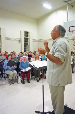 Choral Christmas Concert
Director Brian Roderick rehearses members of the Sippican Choral Society in the First Congregational Church Hall in Mattapoisett in preparation for their annual holiday concerts to be held on Friday, December 2 at Grace Episcopal Church in New Bedford and Sunday, December 4 at Tabor Academys Wickenden Chapel in Marion. Tickets are $10 and are available at The Bookstall, 151 Front Street in Marion and Seaport Village Ice Cream and Coffee Shoppe in Mattapoisett. (Photo by Kenneth J. Souza).
