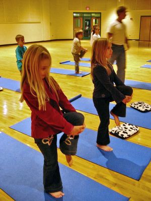 Yoga for Youth
Students at Sippican School in Marion enjoy the benefits of yoga classes which have been sponsored at the school by the non-profit Yoga Kids, Inc. for the past six years. Teachers have noted marked improvement in students who take yoga classes as it helps them to better concentrate in class. Yoga classes in Marion are partially funded through the Marion Institute and the Upstream Foundation. (Photo courtesy of Timothy Donohue).
