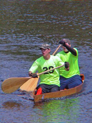 River Rivals
Cody Faustinho and Chris Faustinho Jr., both of Rochester, paddle their way down the Mattapoisett River from Grandma Hartleys Reservoir in Rochester during the 2006 running of the annual Memorial Day Boat Race. The yearly tradition drew 80 two-person teams who made the nearly 11-mile trek in small, wood-framed boats. (Photo by Kenneth J. Souza).
