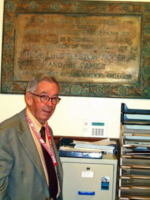 Family Ties
Michael D. Coe of New Haven, CT, a descendent of Henry Huttleston Rogers, poses in front of the plaque honoring his famous beneficent ancestor at Center School in Mattapoisett during a recent trip to visit all the sites in town related to his familys rich history. (Photo courtesy of Natalie Hemingway).
