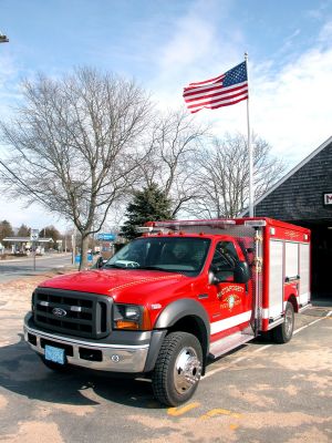 Mattapoisett to the Rescue
The Mattapoisett Fire Department recently acquired this new 2006 Rescue Truck which was first put into service just last Thursday, February 15, according to Fire Chief Ronald Scott. The new $50,000 Ford vehicle, which was approved under Article 5 of the 2006 Annual Town Meeting warrant as part of the towns new Capital Equipment Plan, will allow rescue workers to carry all the latest state-of-the-art equipment to emergency scenes. (Photo by Kenneth J. Souza).
