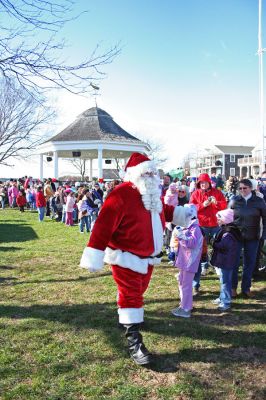 Santa by the Sea
Here Santa Claus arrives to greet eager children after being transported by fire truck to Mattapoisett's annual "Holiday in the Park" celebration which was held in Shipyard Park on Saturday, December 1, 2007 and drew a record crowd to the seasonal seaside event. (Photo by Robert Chiarito).
