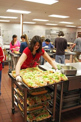 Super Subs
About 35 students and 20 adult members of Friends of Old Rochester Music (FORM) gathered in the early morning hours of February 3 to make hundreds of submarine sandwiches in their annual effort to raise money for the Old Rochester School Districts various music programs. The sandwiches, ten-inch Italian subs piled high with toppings, were pre-sold in the days leading up to Super Bowl XLII at $6 apiece by the student musicians from all of the Old Rochester Schools. (Photo by Robert Chiarito).
