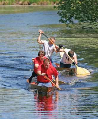 Rowing on the River
Longtime Memorial Day Boat Race participants and Rochester residents Jeff Eldridge and Walter Gonet (Team #3, front) battle it out with fellow contestants Jake Goyette and Joe Goyette (Team #4, back) to cross the finish line in the 2008 event. Once adjusted start times were calculated, Team #4 ultimately finished in fourth place with an elapsed time of 1:56:32 and Team #3 placed sixth overall with a final time of 1:57:28. (Photo by Kenneth J. Souza).
