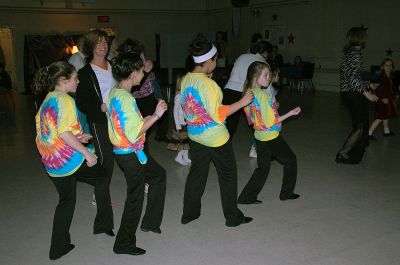 Dance the Night Away
The Mattapoisett Congregational Church hosted a family-oriented night of "Dancing with the Stars" on Friday, March 23. Young and old alike danced to the music of DJ Don Hunt from City Lights Disc Jockey Services and then were thrilled to dance alongside special guest 'stars' The Cat in the Hat and Shrek! Here, members of Heidi Parker Catelli's dance troupe show off a few choice dance steps. (Photo by Robert Chiarito).
