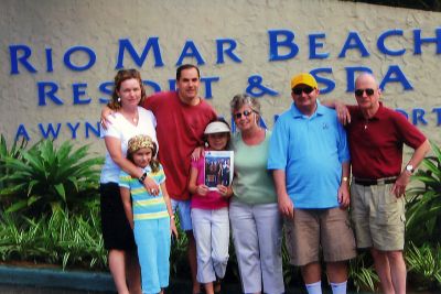 Puerto Rico
The Dyson and Goss families of Mattapoisett recently visited Puerto Rico during the February school vacation week and took this photo posing with The Wanderer at the resort where they stayed. (Photo by Franck Tebou). (03/06/08 issue)
