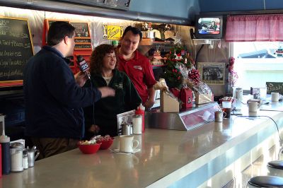 Fox at the Nest
Doug "VB" Goudie of Fox 25 Morning News chats with Nest Diner owners Barbara and Randy St. John during the recent segment of "Diner Wednesday" broadcast from the Mattapoisett establishment on December 3, 2008. (Photo by Robert Chiarito).
