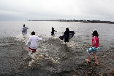 Frigid Friend-zee
Five freezing friends took the chilly plunge as part of the Third Annual Frigid Friend-Zee which was held on Saturday morning, March 1 at YMCAs Camp Massasoit in Mattapoisett. The annual event was moved from January to March this year and is done to raise funds for the YMCAs after-school programs. (Photo by Robert Chiarito).
