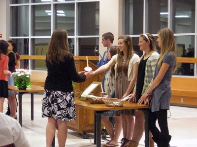 Honor Guard
Hillary Rozenas, who is a senior at ORR high school, receiving her candle from (left to right) Katelyn Simmons, AnnMarie Kassabian, Kate Hartley and Alia Marinone during the recent ORR Honor Roll Induction Ceremony. (Photo by Olivia Mello)
