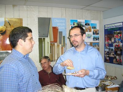 Habitat Home
Buzzards Bay Area Habitat for Humanity Board Member Steve Grima talks with BBAHFH President Al Amaral at the open house celebrating the organization's relocation of its offices to Mattapoisett on March 25. (Photo by Ricky A. Pursley)

