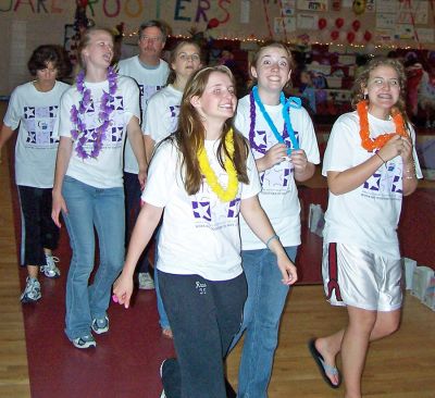 ORR Relay for Life
Just some of the nearly 200 students, teachers, family members and friends who recently participated in the Relay for Life to benefit the American Cancer Society (ACS) at Old Rochester Regional High School on Friday, June 10. The fund-raising event kicked off with the first laps led by cancer survivors, while 17 teams of walkers continued on throughout the 18-hour event. This years walk raised more than $48,000 for ACS programs.
