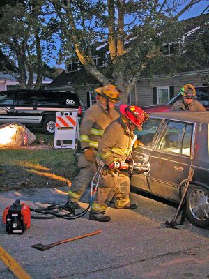 "Jaws of Life"
Members of the Mattapoisett Fire Department provide a demonstration of the Jaws of Life during the recent Open House held on Thursday, October 5 at the Mattapoisett Fire Station. The family-friendly event is held each year in conjunction with National Fire Prevention Week to educate the public on the departments life-saving abilities and fire and safety techniques. (Photo by Robert Chiarito).
