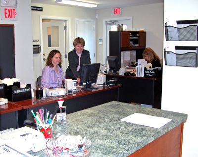 New Digs in Mattapoisett
Staff members working in Mattapoisetts newly-renovated Financial Department at the rear of the first floor of Town Hall include (l. to r.) Catherine Barrows, Town Treasurer/Tax Collector Brenda Herbeck, and Sarah Piehler. An Open House has been slated for Wednesday, January 17 from 9:00 to 11:00 am so residents can view the newly-completed offices firsthand. All are welcome and refreshments will be served. (Photo by Kenneth J. Souza).
