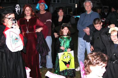 Marion Halloween '06
Little boys and ghouls gathered outside the Marion Music Hall after the Annual Halloween Parade in the town village to collect treat bags packed by the good witches of the Marion Art Center, who sponsored the popular event. This years parade drew in excess of 300 participants who wore costumes of all shapes and sizes. (Photo by Kenneth J. Souza).
