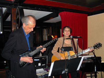 Library Blues Benefit
David Gries (left) and Library Director Judy Wallace (right) perform during the Third Annual Library Night benefit held at the Kinsale Inn in Mattapoisett on Monday, January 22. In addition to great music, the event featured the Inns shepherds pie, corned beef, beer, wine, and ale. An estimated 168 tickets were sold for the event which raised over $2,000 for the Librarys Building Fund. (Photo by Nancy MacKenzie).
