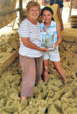 Brick by Brick
Jackie Dyson and her grandmother, Pat Goss, pose with a copy of The Wanderer during a recent trip to Williamsburg, VA where they learned how bricks are made. (09/04/08 issue)
