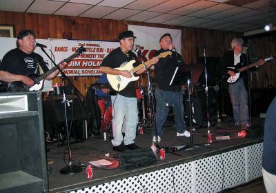 Fab Faux
Octopuss Garden, a Beatles tribute band, rocked the Second Annual Jim Holmes Memorial Scholarship Dance at the Knights of Columbus Hall in Mattapoisett. (Photo by Adam Silva)

