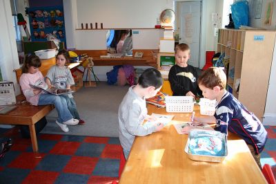 Reading Aloud
On Friday, January 25, Stephen Lynch, whose daughter Sophie attends the schools Kindergarten program, took his turn reading to the children at the Kindercare Learning Center in Marion. The school was celebrating the Patriots trip to this years Super Bowl with a Patriots Day by dressing in team colors to show the spirit and support. (Photo by Robert Chiarito).
