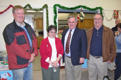Rochester Welcomes LaCamera
Newly-hired Rochester Town Administrator Richard LaCamera (third from left) poses with (from left) Board of Selectmen Chairman Bradford Morse, Council on Aging Director Sharon Lally, and Selectman Dan McGaffey during a welcome reception held at the Rochester Senior Center on Monday, December 18 in Mr. LaCamera's honor. (Photo by Kenneth J. Souza).
