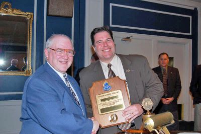 Lions' Share
Past Lions Club International Director John Hoyle recently presented Dr. Jeffrey G. Swift with the 2008 Melvin Jones Fellowship Award for his dedication to helping others. Dr. Swift is a member of the Mattapoisett Lions Club and local business owner of Mattapoisett Chiropractic and Sports Medicine. The Melvin Jones Fellowship is recognition of a persons commitment to humanitarian work. Dr. Swift has been a member of the Mattapoisett Lions Club since 1991. (Photo courtesy of Rebecca McCullough).
