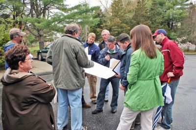 Marion Housing
Marion Affordable Housing Trust Chairman Reg Foster addresses a group of prospective architects, builders and engineers at the Little Neck Village housing complex on Saturday, May 3 along with Trust member Ora Mae Torres (foreground). The site visit also included a review of the proposed plans and a walk-through of the property in anticipation of bids to expand the 40B housing complex which are due on June 12. (Photo by Robert Chiarito).

