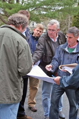 Marion Housing
Marion Affordable Housing Trust Chairman Reg Foster addresses a group of prospective architects, builders and engineers at the Little Neck Village housing complex on Saturday, May 3. The site visit also included a review of the proposed plans and a walk-through of the property in anticipation of bids to expand the 40B housing complex which are due on June 12. (Photo by Robert Chiarito).


