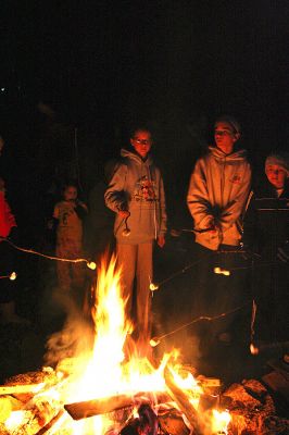 Cozy Campfire
The Mattapoisett Land Trust sponsored a bonfire at the Dunseith Gardens Seahorse property on Saturday, October 18, which included toasting marshmallows and entertainment provided by Luana Josvold. (Photo by Robert Chiarito).
