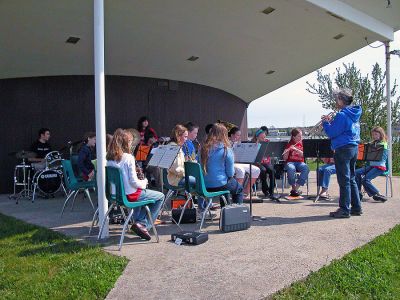 Marion Spruces Up
Marion celebrated Arbor Day on Saturday, May 12 by urging people to come out and volunteer their time for a town wide clean-up effort. Here members of the Sippican School Band perform at Island Wharf during the event. (Photo by Robert Chiarito).
