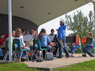 Marion Spruces Up
Marion celebrated Arbor Day on Saturday, May 12 by urging people to come out and volunteer their time for a town wide clean-up effort. Here members of the Sippican School Band perform at Island Wharf during the event. (Photo by Robert Chiarito).
