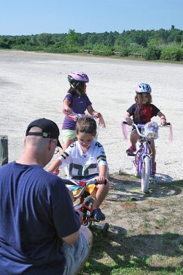 Bike Safety Day
The Marion Police Department sponsored a Bicycle Safety Day for children and young adults at Silvershell Beach on Saturday morning, August 2. The day included bicycle safety information, a rodeo course and certificate awards for all participants. In addition, the Marion Police Department was awarded a statewide grant by the Massachusetts Executive Office of Public Safety and Security to provide 75 bicycle helmets during the event. (Photo by Robert Chiarito).
