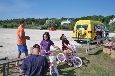 Bike Safety Day
The Marion Police Department sponsored a Bicycle Safety Day for children and young adults at Silvershell Beach on Saturday morning, August 2. The day included bicycle safety information, a rodeo course and certificate awards for all participants. In addition, the Marion Police Department was awarded a statewide grant by the Massachusetts Executive Office of Public Safety and Security to provide 75 bicycle helmets during the event. (Photo by Robert Chiarito).
