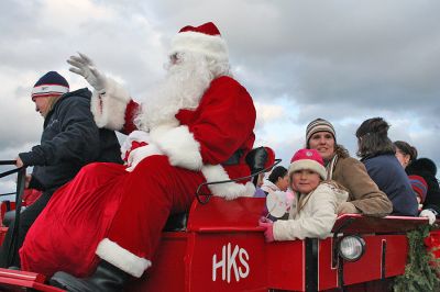 Santa's Buggy
Jolly Saint Nick takes a horse and buggy ride through Marion center with some of his eager fans during the annual Village Stroll held on Sunday, December 14. (Photo by Robert Chiarito).
