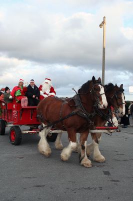 Santa's Buggy
Jolly Saint Nick takes a horse and buggy ride through Marion center with some of his eager fans during the annual Village Stroll held on Sunday, December 14. (Photo by Robert Chiarito).

