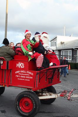 Santa's Buggy
Jolly Saint Nick takes a horse and buggy ride through Marion center with some of his eager fans during the annual Village Stroll held on Sunday, December 14. (Photo by Robert Chiarito).


