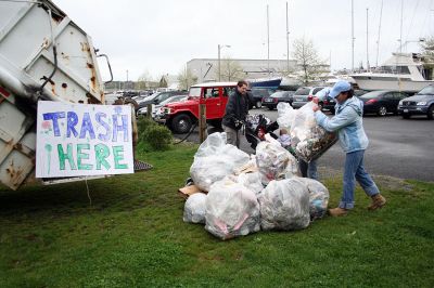 Marion Cleanup
The Marion Tree Committee, the Sippican Lands Trust, the Sippican Historical and Preservation Society, the Marion Garden Discussion Group, the Marion Natural History Museum and the Town of Marion Department of Public Works (DPW) sponsored an "Arbor Day - Spring Clean Up" on Saturday, May 10 with residents pitching in to help dispose of all their winter trash. (Photo by Robert Chiarito).
