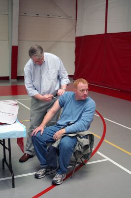 Flu Clinic
Dr. Tom Streeter gives a flu shot to Zack Shelton during the recent Marion Flu Clinic held at Tabor Academy on November 8. (Photo by Robert Chiarito).
