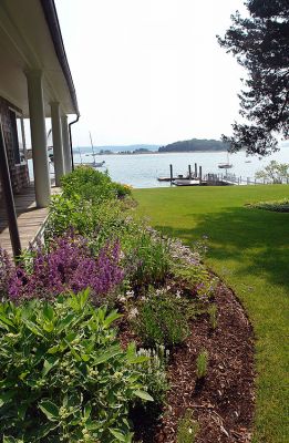 Gorgeous Gardens
One of the many beautiful homes that will be included in the annual Gardens by the Sea, a tour of private, Marion gardens sponsored by Saint Gabriels Episcopal Church, which will take place on Friday, July 11 from 10:30 am to 4:30 pm. The event will include a luncheon at a private seaside club and a Bake/Plant Sale. Tour Only tickets are $20 each and may be purchased at the Marion General Store and Saint Gabriels Church in Marion. (Photo by and courtesy of Laura McLean.)
