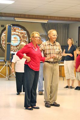 Do-Si-Do in Marion
On Sunday, September 14, the first of what is hoped to be an annual series of Marion Square Dances was held inside the Marion Community Center. Although initially slated to take place in the parking lot adjacent to the Marion General Store, the weekends rainy weather forced the event indoors. Caller Jim Schell of Lakeville had veteran square dancers and novices alike promenading, allemanding, bowing to their partners and do-si-doing with ease. (Photo by Robert Chiarito).
