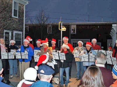 Sounds of the Season
Christmas music filled the air as this band of carolers performed during the 2006 Annual Holiday Village Stroll in Marion on Sunday, December 10. (Photo by Joe LeClair).
