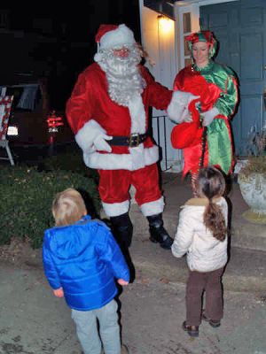 Santa in Sippican
Children greet Jolly Ol' Saint Nick during the 2006 Village Holiday Stroll in Marion on Sunday, December 10. (Photo by Joe LeClair).
